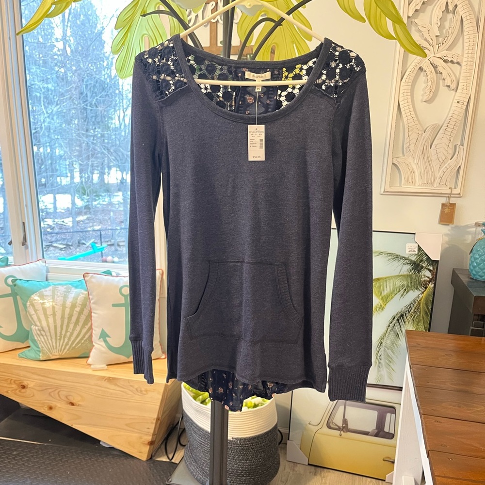 Super Cute Sweater, unique back detail!